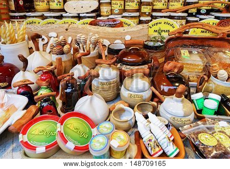 Stall With Ceramics And Honey Goods At Riga Christmas Market