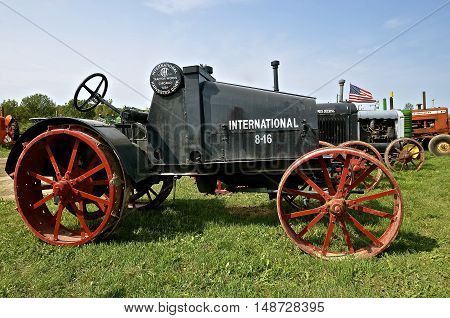 ROLLAG, MINNESOTA, Sept 1. 2016: An International 8-16 antique tractor by IHC  is displayed at the West Central Steam Threshers Reunion in Rollag, MN attended by 1000's held annually on Labor Day weekend.
