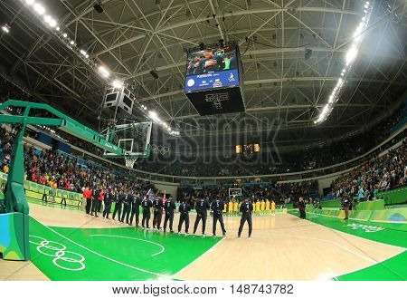 RIO DE JANEIRO, BRAZIL - AUGUST 10, 2016: Team United States during National Anthem before group A basketball match between Team USA and Australia of the Rio 2016 Olympic Games at Carioca Arena 1