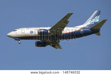 SAINT PETERSBURG, RUSSIA - AUGUST 21, 2015: Boeing 737-5Y0 (VP-BQI ) company Nordavia in flight close up