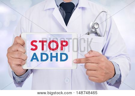 STOP ADHD Doctor holding digital tablet doctor work hard
