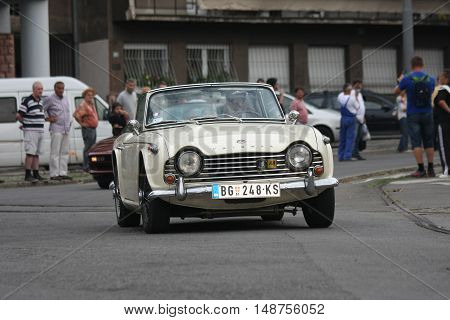 BELGRADE,SERBIA - SEPTEMBER 10, 2016: Old Triumph at the commercial race of old cars in memory of formula 1 race held on the same place in 1939 two days after the beginning of Second World War when the famous Italian driver Tazio Nuvolari won
