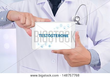 TESTOSTERONE Doctor holding digital tablet doctor work hard