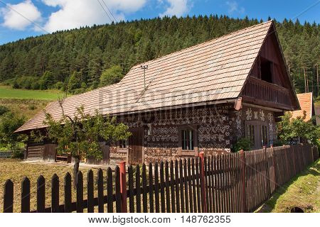 CICMANY, SLOVAK REPUBLIC, AUGUST 23, 2016: Traditional folk architecture. The old wooden house painted ornament. The village Cicmany with the painted wooden houses is on the list of UNESCO.