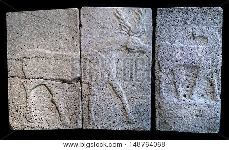 Ancient stone bas-relief with deer of late Hittite period