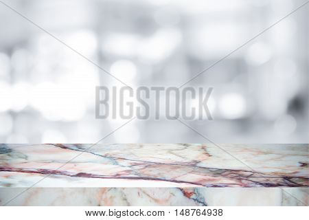 white marble stone countertop or table on white blurred abstract background / for display or montage your products