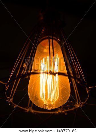 light bulb and lamp in vintage style. Warm tone light bulb lamp. Lamps in coffee shop.