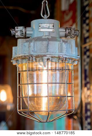 light bulb and lamp in vintage style. Warm tone light bulb lamp. Lamps in coffee shop.