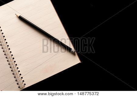 Stationary, Notebook and pencil use in business office black background