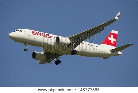 SAINT PETERSBURG, RUSSIA - AUGUST 21, 2015: Airbus A320 (HB-JLT) Swiss International Air Lines before planting