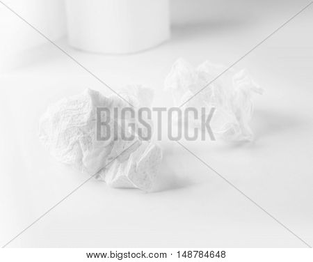 Crumpled paper ball isolated on white background. Bluren concept