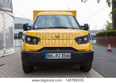 HANNOVER GERMANY - 23 2016: New electric mail delivery van from the Deutsche Post DHL at the IAA Commercial Vehicles 2016 International Trade Fair