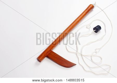 Kusarigama japanese martial arts equipment is on white background.