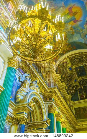 SAINT PETERSBURG RUSSIA - APRIL 25 2015: The St Isaac's Cathedral boast unique and splendid decorations of different technics making it one of the most interesting and expencive object of art on April 25 in Saint Petersburg.