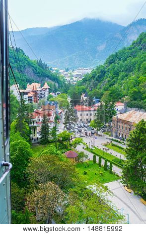 The view from the cable car riding from Plateau station on the mineral water park and the buildings of Borjomi old town Georgia.