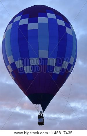 QUEENSBURY, NY - SEP 24: Balloon launch at dawn at the 2016 Adirondack Hot Air Balloon Festival held from Sep 22-25. Thousands of people attended the festival which is the largest of its kind on the East coast.