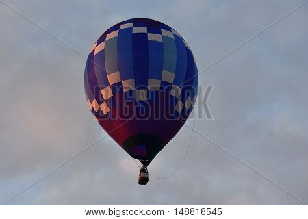 QUEENSBURY, NY - SEP 24: Balloon launch at dawn at the 2016 Adirondack Hot Air Balloon Festival held from Sep 22-25. Thousands of people attended the festival which is the largest of its kind on the East coast.