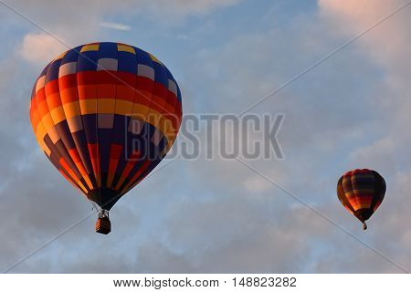 QUEENSBURY, NY - SEP 24: Balloon launch at dawn at the 2016 Adirondack Hot Air Balloon Festival held from Sep 22-25. Thousands of people attended the festival which is the largest of its kind on the East coast.