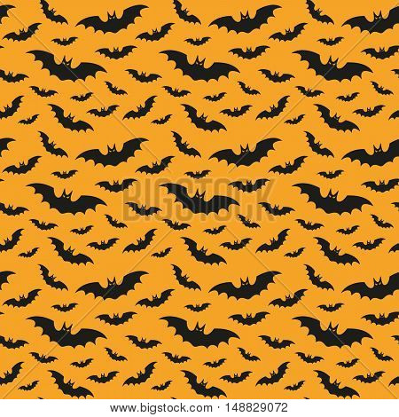 Halloween pattern with bats on the orange background.