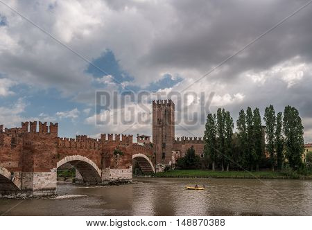 Beautiful photo of medieval stone bridge Ponte Scaligero built in 14th century near Castelvecchio. Verona, Italy.