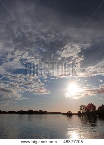 Sunset over the still waters of the esturay