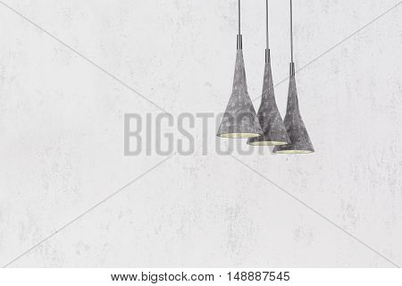 Industrial pendant lamps against rough wall, loft style