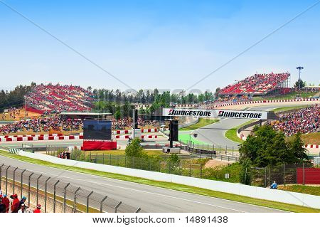 Spectators on tribunes on The Formula 1 Grand Prix