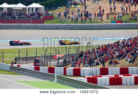 Racing cars on a circuit during The Formula 1 Grand Prix at autodrome 