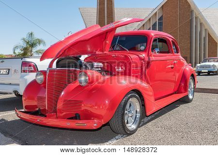 KIMBERLEY SOUTH AFRICA - SEPTEMBER 24 2016: A public display of new and vintage cars at a fair at the Dutch Reformed Church Vooruitsig in Kimberley