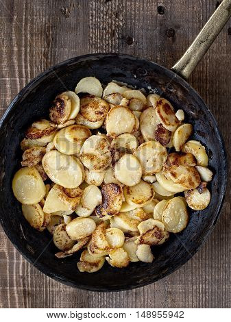 close up of rustic german bratkartofflen fried potatoes