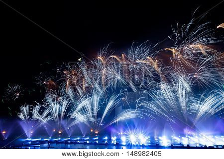 MOSCOW RUSSIA - SEPTEMBER 25 2016: The Circle of Light Moscow international festival 2016. Music fire light and fireworks show at the Krylatskoye Grebnoy Channel free open air performance.