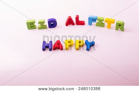 The Word Eid El Fitr  Written With Colorful Letter Blocks