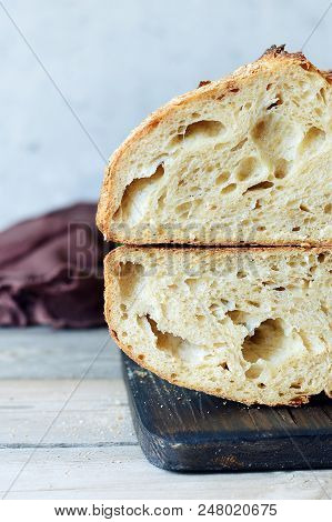 Fresh Homemade Bread On The Blue Background. Crisp. French Bread.  Bread At Leaven. Unleavened Bread