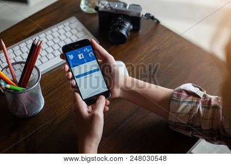 Chiang Mai ,thailand July 04 2018 : Man Holding A Iphone 6S With Social Internet Service Facebook On