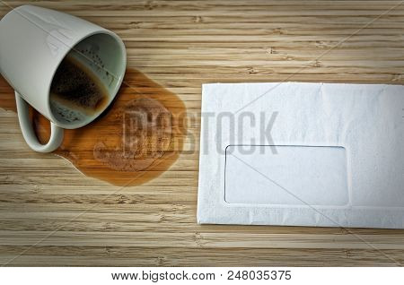 Letter With Free Text Field For Inserting A Font And A Dumped Coffee Cup