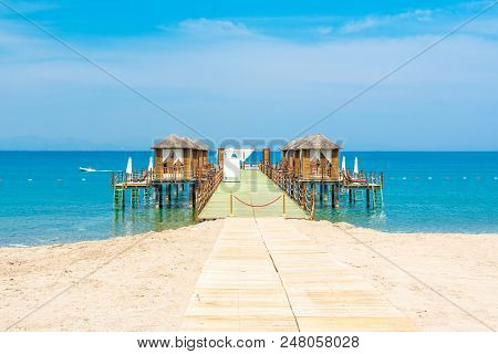 Wooden Beach Pavilions On The Shore Of A Sandy Beach - The Mediterranean Coast, Beldibi, Antalya, Tu