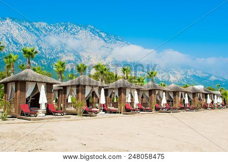 Wooden Beach Pavilions On The Shore Of A Sandy Beach - The Mediterranean Coast, Beldibi, Antalya, Tu