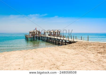 Wooden Beach Pavilions On The Shore Of A Sandy Beach - The Mediterranean Coast, Beldibi, Antalya, Tu