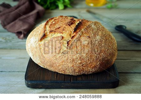 Fresh Homemade Bread On A Gray Background. Crisp. French Bread.  Bread At Leaven. Unleavened Bread. 