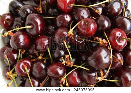 Fresh Ripe Cherry On A Plate, Top View.