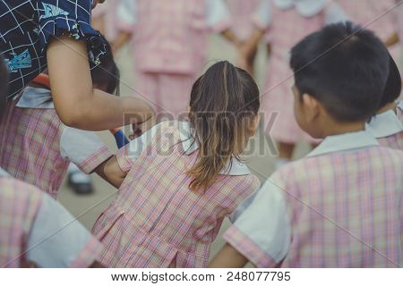 Young Kids Exercise With Hoola Hoop In The Morning.