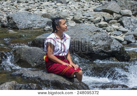 Batad, Philippines - May 02 : Girl From Ifugao Minority Near A Waterfall In Batad The Philippines On