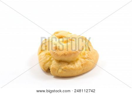 One Round Yummy Profiterole Isolated On A White Background.
