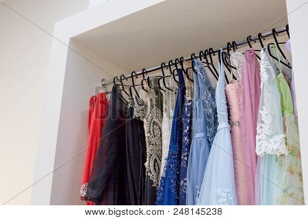Many Ladies Evening Gown Long Dresses On Hanger In The Dress Rent Shop For The Wedding Day Or Photo 