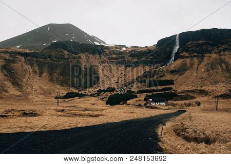Bjarnafoss Is A Tall Waterfall Tumbling Right Behind The Small Farming Hamlet Of Buir