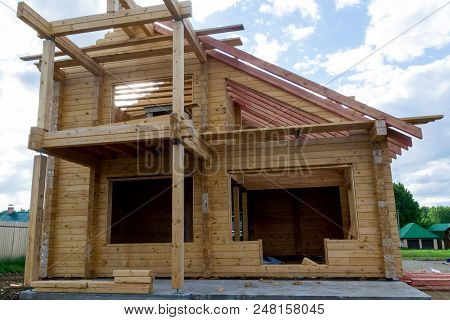 Construction Of A House Made Of Laminated Lumber. The Frame Of The House. Cottage Made Of Laminated 