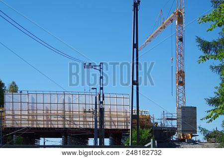 A Construction Site With A Big Crane In Downtown Ludvika