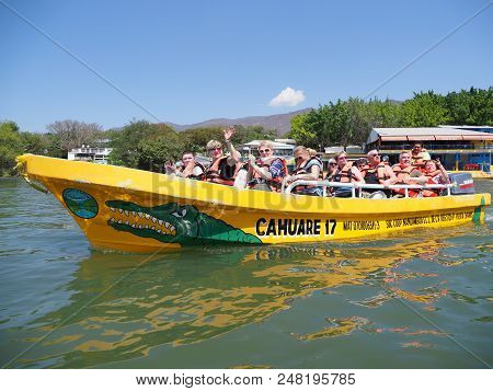 Tuxtla, Mexico North America On February 2018: Yellow Motor Boat And Group Of Tourists, Grijalva Riv