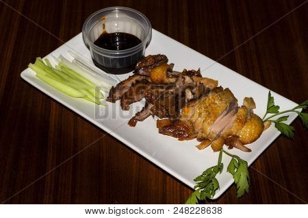 Lacquered Duck To The Pekinese