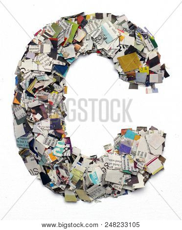 Letters made from newspaper capitel C isolated on white 